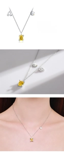 Detail of S925 silver Leo necklace with square yellow gemstone and zodiac charm