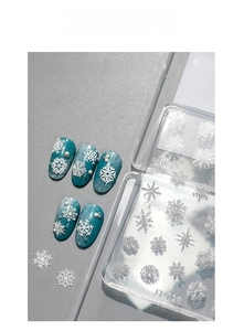 Detailed macro view of JT-028 3D snowflake nail stickers for DIY winter nail art designs