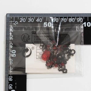 Gothic choker with red blood drop beads and black chain in transparent packaging