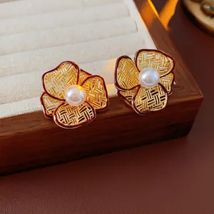 French vintage gold hollow flower earrings with white pearl and deep red-brown accents