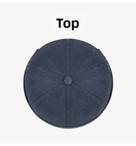 Top view of navy blue washed cotton docker hat showing six-panel stitch and button