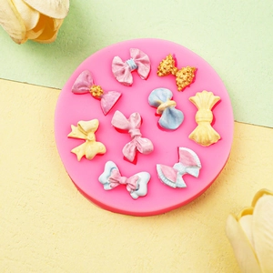 Pink silicone mold for bow-shaped fondant and chocolate DIY baking tools