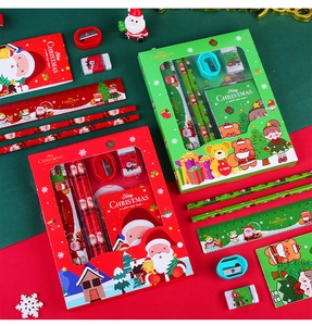 Close-up of a 6-piece Christmas stationery set with pencils, ruler, and a notebook