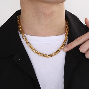 Gold square link chain necklace for men in rock hip-hop style worn by a model