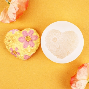Detailed heart-shaped floral relief silicone mold for DIY candles and soaps