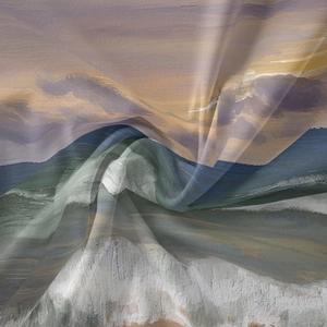 Macro detail of Bohemian tapestry showing soft fabric texture and ocean wave landscape print