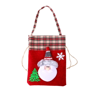 Red plaid Christmas gift bag with Santa Claus and snowflake felt applique handles