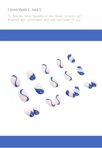 Detail of round press-on nails featuring blue and white wavy stripes with a glossy finish