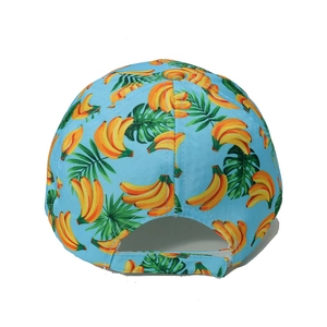 Rear view of light blue baseball cap featuring tropical banana leaf print and velcro strap