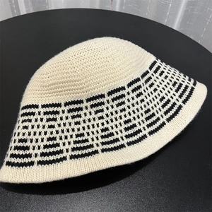 Top-down shot showing the detailed jacquard knit texture of this bucket hat
