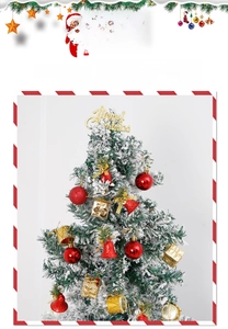 Detailed view of red Christmas ornaments, golden bells and gift boxes on a snowy tree