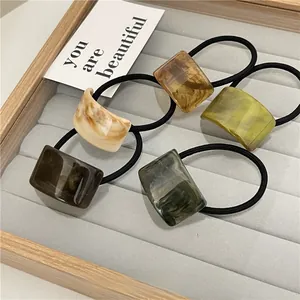 Set of 5 high-elasticity hair ties with marble texture resin blocks in earth tones