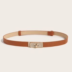 Slim brown crossgrain faux leather waist belt with gold rhinestone-encrusted buckle