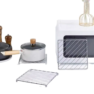 Three square silver stainless steel kitchen heat insulation pads for countertops
