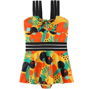 Tropical leaf print girls' swimsuit set with orange ruffles and striped straps