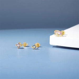 Detailed view of S925 silver stud earrings set with colorful zircon and gold plating