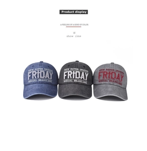 Detailed view of Friday embroidered baseball caps in navy, black and grey washed cotton