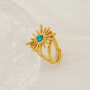 Retro geometric sunburst gold ring for women with turquoise inlay on white background