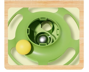 Close-up of green cat track toy with yellow ball and metallic sphere details