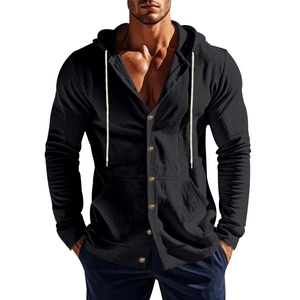 Detail shot of black linen hoodie with wood texture buttons and adjustable white drawstrings
