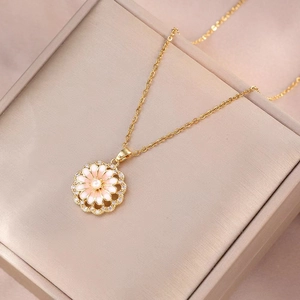 Elegant gold necklace with pink enamel flower pendant, pearl center and zircon accents