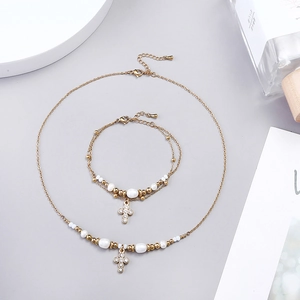Gold plated stainless steel jewelry set with pearl beads and crystal cross pendant