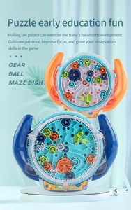 Macro detail of educational gear maze toy showing rotating gears and metal ball path