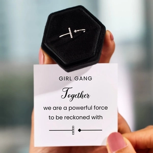 Close-up of S925 sterling silver T-shape ring with crystals in a black velvet gift box