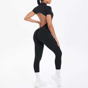 Close-up of black short sleeve bodysuit featuring back cutout and scrunch butt detail