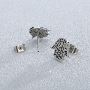 Hamsa Hand hollow stud earrings in silver titanium steel with classic openwork palm design