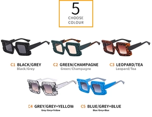 Detail of oversized square sunglasses featuring unique stone-textured frames in five colors