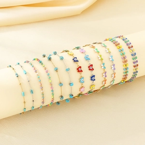 Bohemian anklet set with colorful enamel butterflies and evil eye beads on silk
