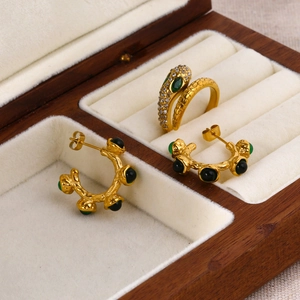Retro 18k gold plated snake ring and green gemstone earrings in a premium wooden jewelry box