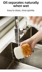 Detail of oil-repellent wood pulp sponge cleaning naturally under running kitchen water