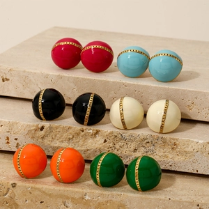 Six pairs of colorful round enamel stud earrings with gold chain link details on stone