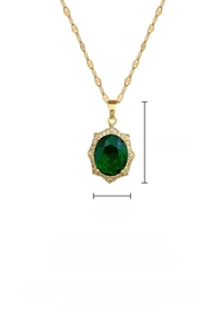 Detail of titanium steel necklace with a 2.5x1.5cm emerald green stone and pavé setting