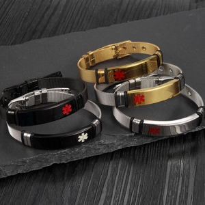Detail of adjustable mesh medical alert bracelets in black, gold, and silver finishes