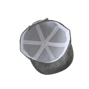 Interior structure of charcoal grey faux suede baby cap with white sweatband details