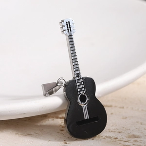 Detailed close-up of a black and silver guitar pendant made of durable stainless steel