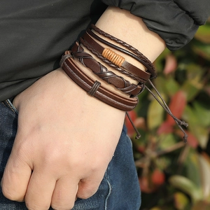 Men's vintage layered leather bracelet set with woven ropes and braided brown bands