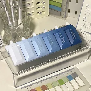 Gradient blue correction tape set of 6 items on a desk display stand for office use