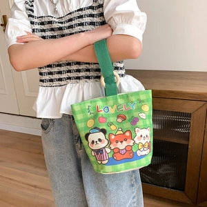 Large green plaid canvas bucket bag with wooden handle and cute animal illustration
