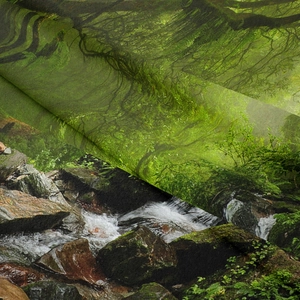 Macro detail of high-definition rainforest waterfall print on soft woven forest tapestry