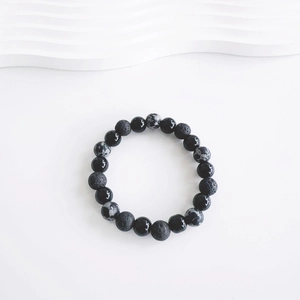 Adjustable 8mm beaded bracelet for men featuring black lava rock and spotted snow stones