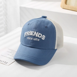 Detail of summer kids baseball cap featuring breathable beige mesh and 3D letter embroidery