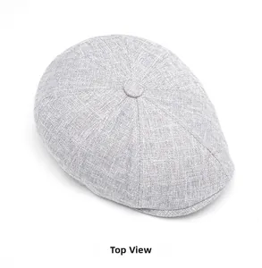 Top view of a light gray cotton linen ivy cap with breathable texture and top button detail