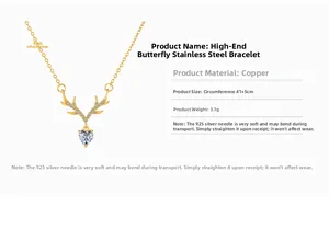 Detailed view of golden heart-shaped elk pendant necklace with pearl and crystal