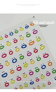 Macro shot of 3D jelly nail stickers with colorful cartoon eye and mouth graffiti patterns