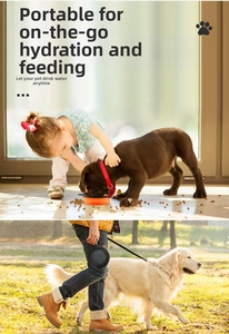Portable silicone folding pet bowls in orange and black with metal carabiner clips