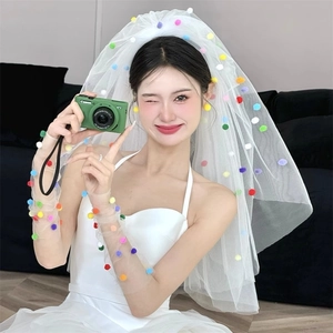 White tiered mesh veil with colorful pom-poms and matching gloves for wedding party